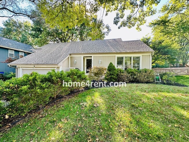 Building Photo - A Lovely, Four Bedroom Lenexa Home w/ Wood...