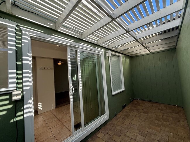 Building Photo - Hard floors, extra closets, patios & fenced yard