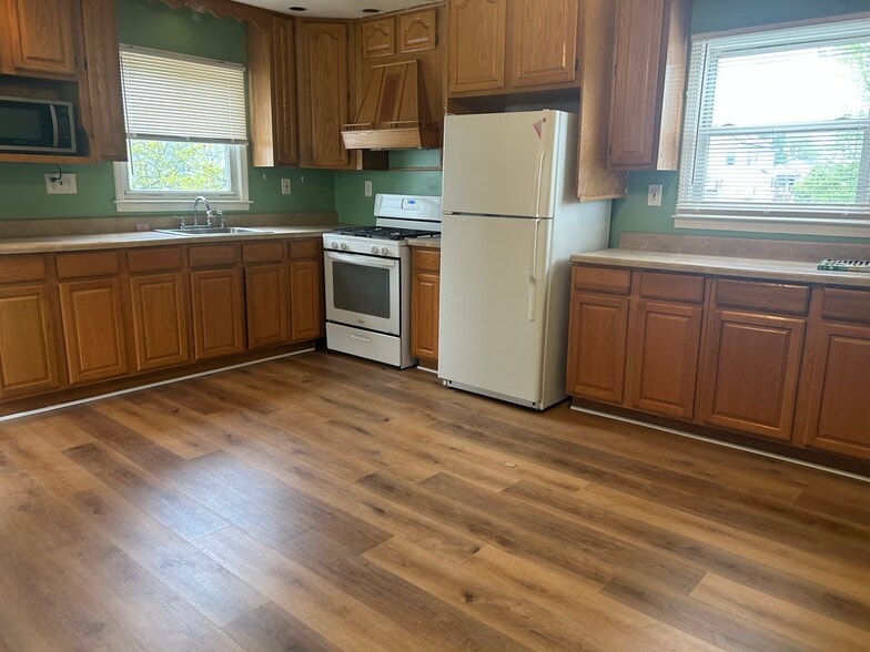 Kitchen with new floors - 702 Edmunds Ave