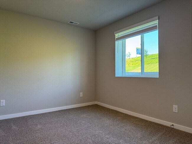Building Photo - Spacious 4-Bedroom Split-Level Near Standing Bear Lake & Trails