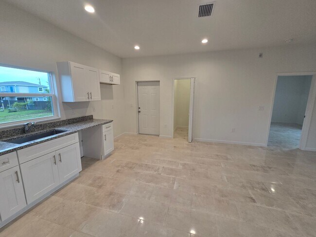 Building Photo - BRAND NEW 3/2/1 -SW LEHIGH ACRES FL
