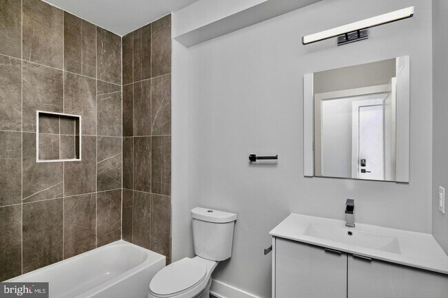 Building Photo - Brand New Luxury Apartments