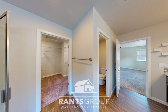Building Photo - Luxury 4-Bedroom Home with 5-Car Garage & ...