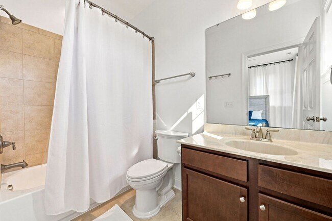 Building Photo - Fully Furnished Option Available | Modern End-Unit Townhome | Prime Raleigh Location