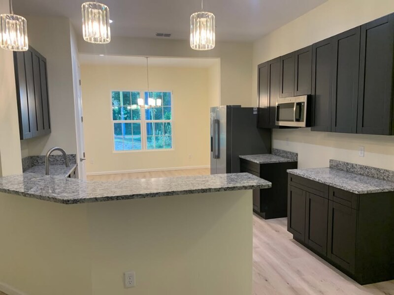 Building Photo - 5871 Collins Rd