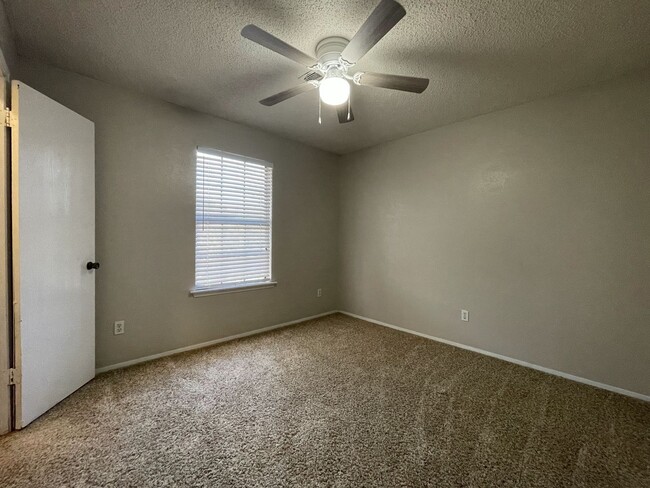 Building Photo - Spacious Snyder Home: 3 Beds, 2 Baths, 2-Car Garage & Cozy Carpeted Bedrooms!