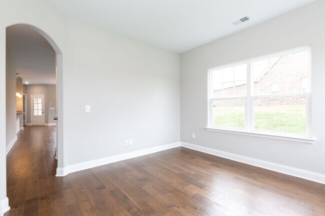 Building Photo - **BE THE LUCKY ONE TO LIVE IN THIS 2022-BUILT UPSCALE COTTAGE HOME IN THE PRESERVE AT BELLE POINTE**