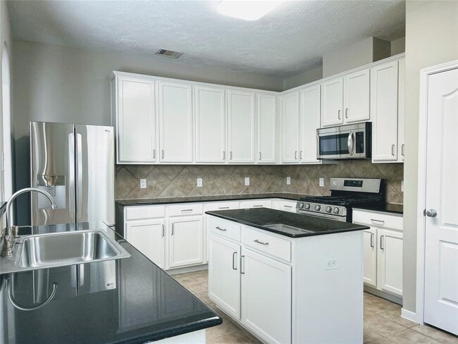 Building Photo - 7415 Hollister Ridge