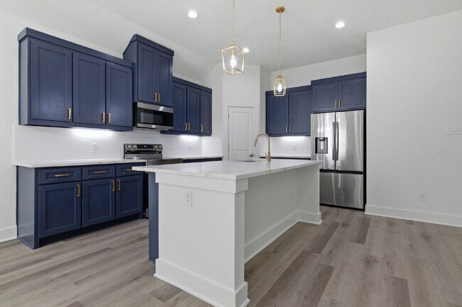 Building Photo - "New Construction 3-2-2 Home with Designer Touches Throughout!"
