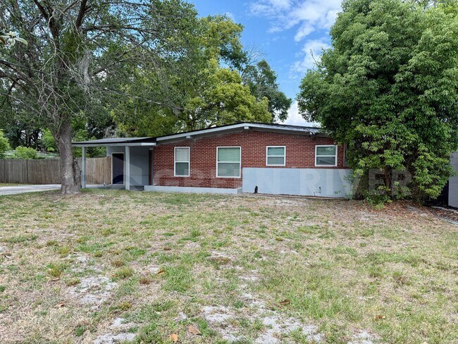 Building Photo - Fully Renovated 2BR Brick Home with Vaulted Ceilings & Backyard Retreat!