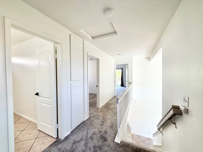 Building Photo - Spacious 5 Bedroom 3 Bathroom Home with Updated Paint, New Roof & Private Balcony