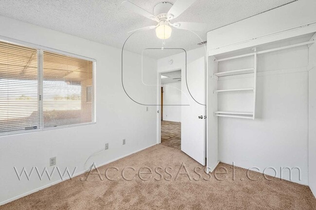 Building Photo - Single-Story 3 Bed with Covered Patio & Gated Yard