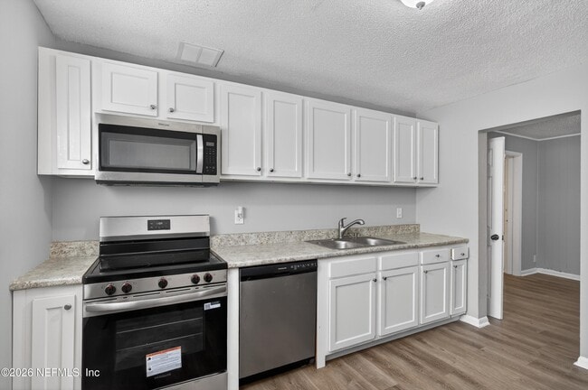 Building Photo - 6955 Miss Muffet Ln S