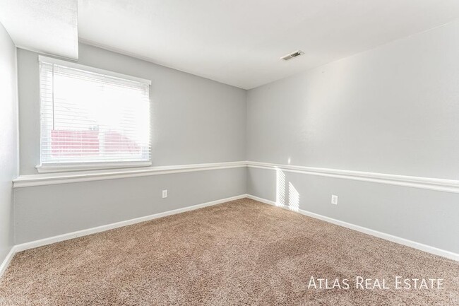 Building Photo - Spacious 3-Bedroom Home with Multiple Livi...