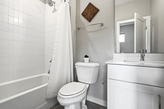 Building Photo - Live Elevated in Downtown Raleigh – Stunning Townhome with Rooftop Oasis!