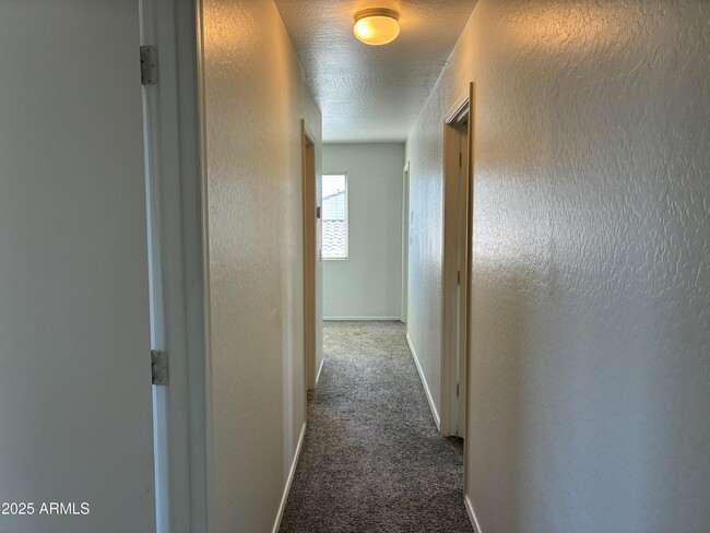 Building Photo - 7287 S Sunrise Way