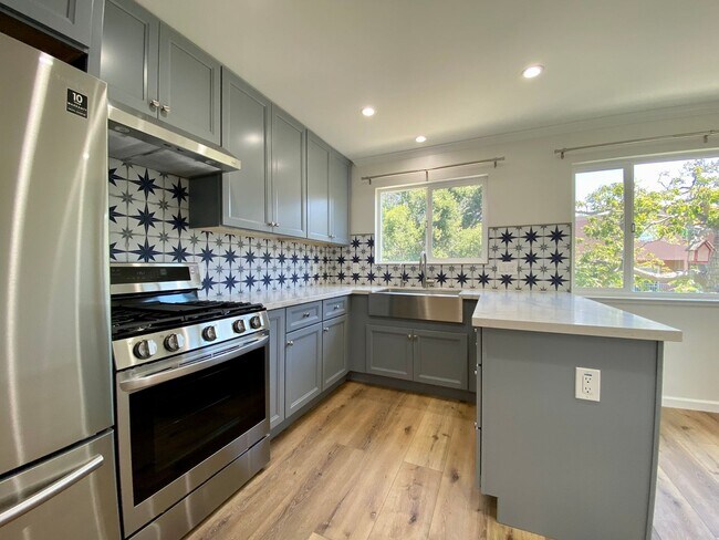 Building Photo - Remodeled 3BR, 2BA with Orchard, Garage & ...