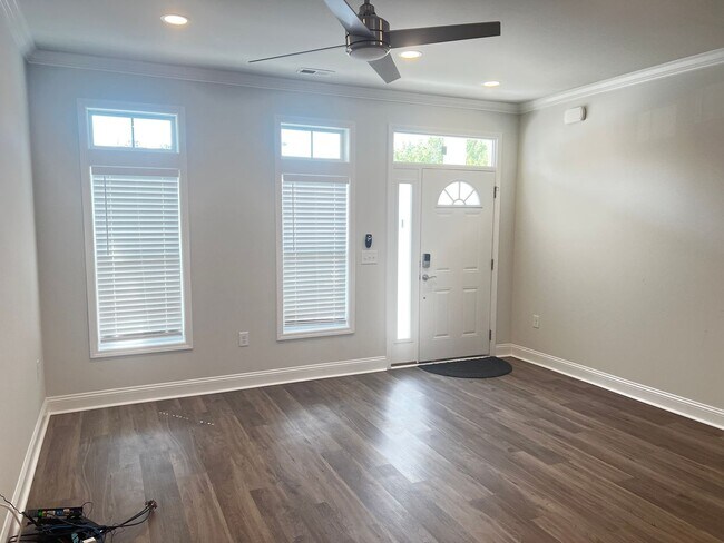 Building Photo - Available Now! - Pet Friendly 2 Bedroom, 2.5 Bath Townhome at Market Common! Cable and Internet I...