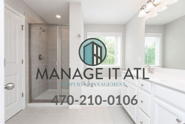 Building Photo - End unit! Gorgeous townhouse in the Suwane...