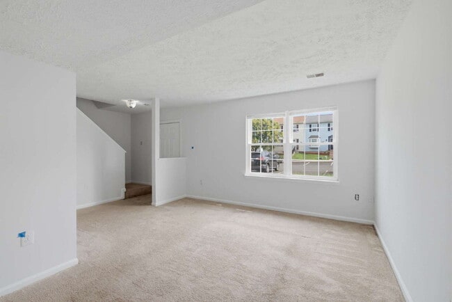 Building Photo - Beautifully Refreshed 3BR Townhome with Private Fenced Backyard in Brandy Station