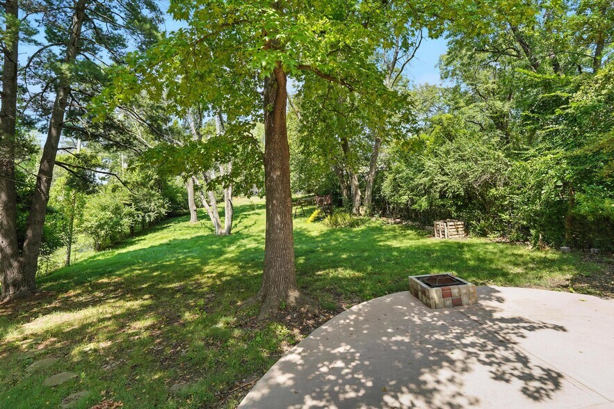 Includes play structure, fire pit, and compost structure - 4100 E 112th St