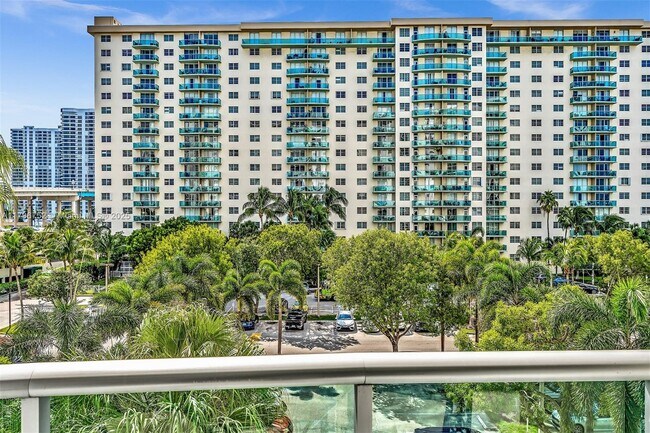 Building Photo - 19380 Collins Ave