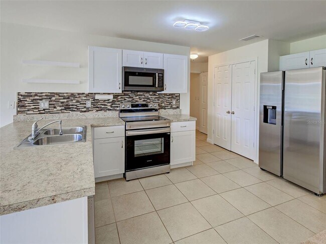 Building Photo - 5442 Guidepost Terrace