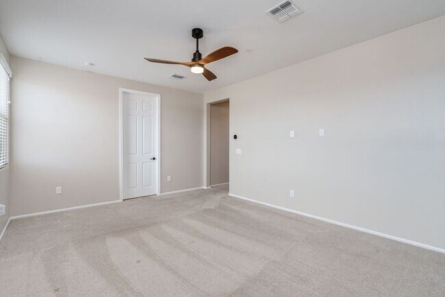 Building Photo - Amazing 4BR 2.5BA Home w/ 3-Car Tandem Garage • Pool Access • Yard w/ Fire Pit in Saguaro Trails