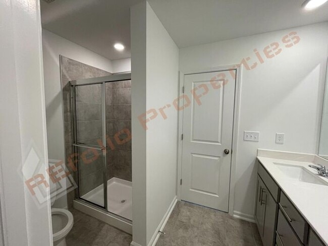 Building Photo - Brand New 2BR/3BA Townhome in Prime Apex L...