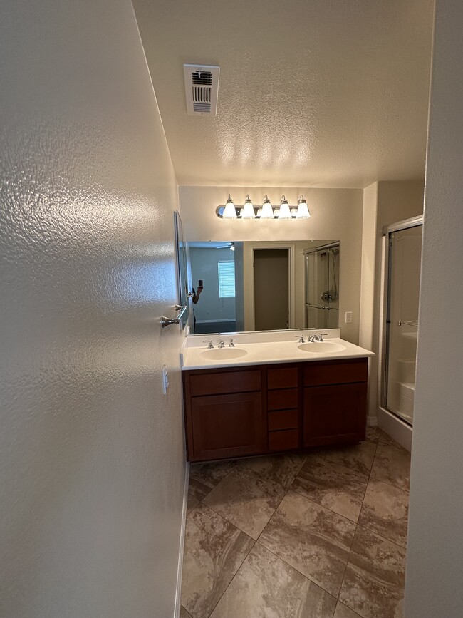 3rd floor master bathroom his and her vanity - 22919 Mariposa Ave