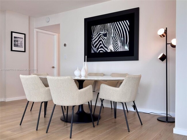 Building Photo - 10230 Collins Ave