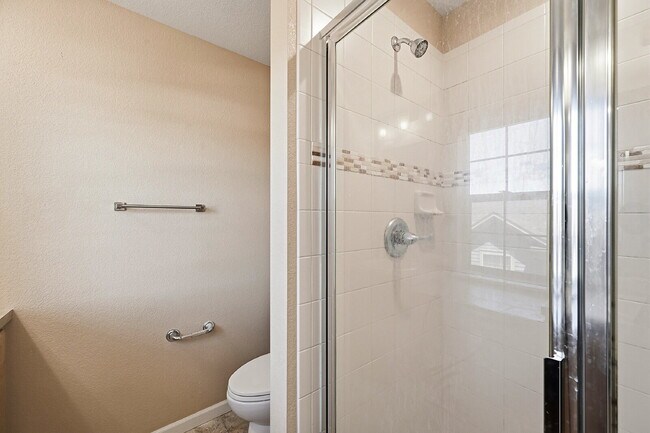 Building Photo - $2,640.95 -  3 Bed, 2.5 Bath Townhome in Denver with Attached Garage and Central AC!