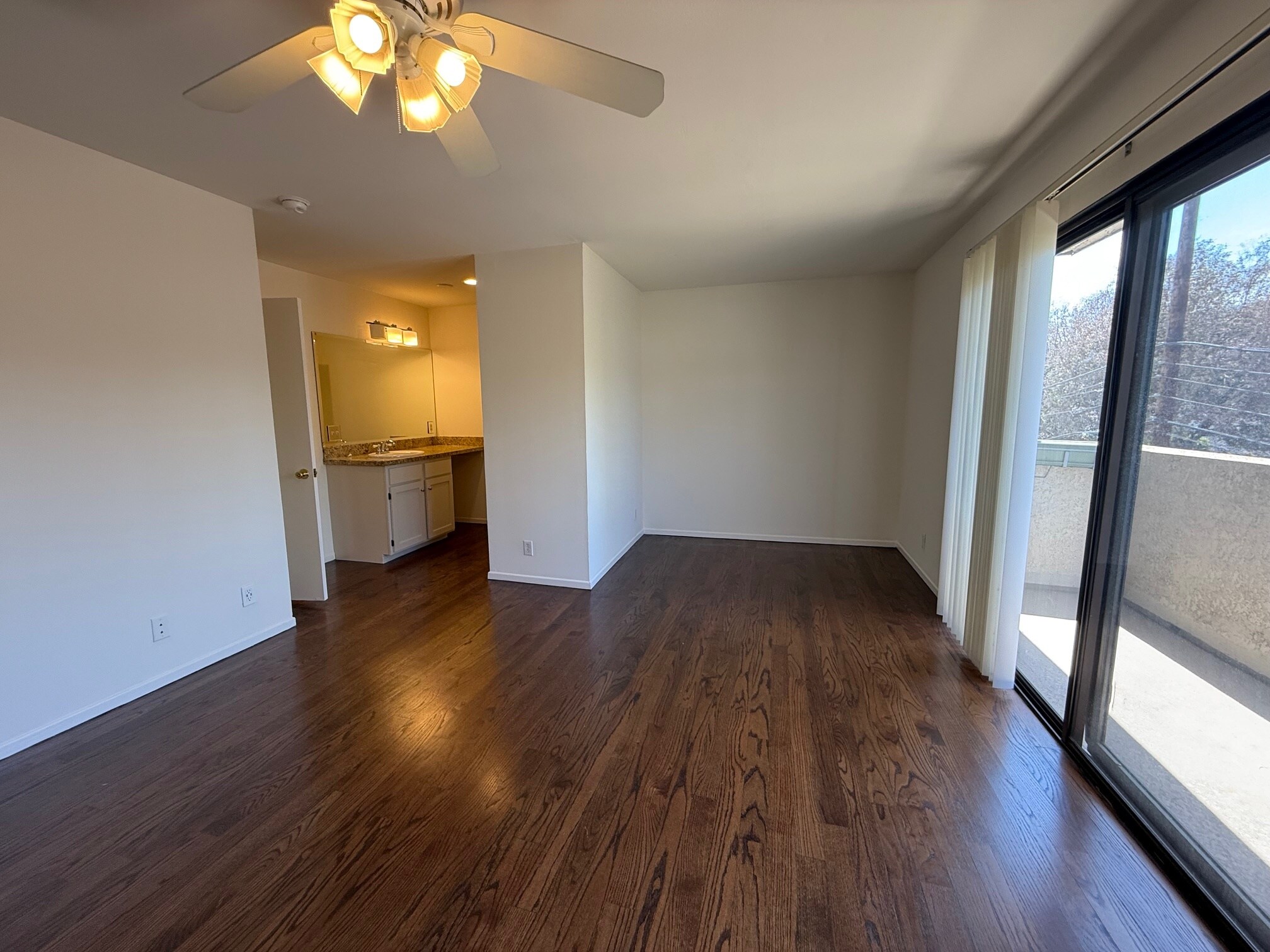 Opposite view of main bedroom with sink, closet and office/sitting area - 10330 Riverside Dr