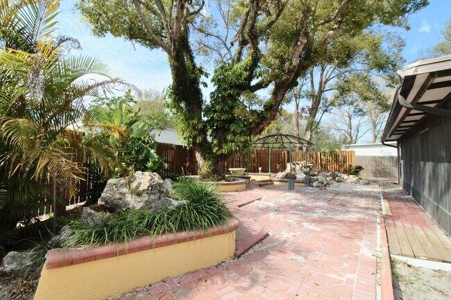 Building Photo - Stunning 3-Bed, 2-Bath Spanish-Inspired Custom Home with Elegant Gardens & Fountains