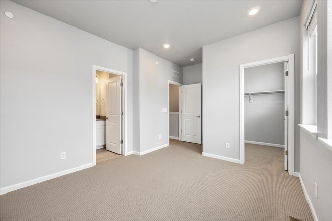 Building Photo - Gorgeous NEW Three Story Townhome with two car attached garage!