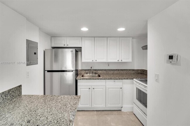 Building Photo - 4335 NW S Tamiami Canal Dr