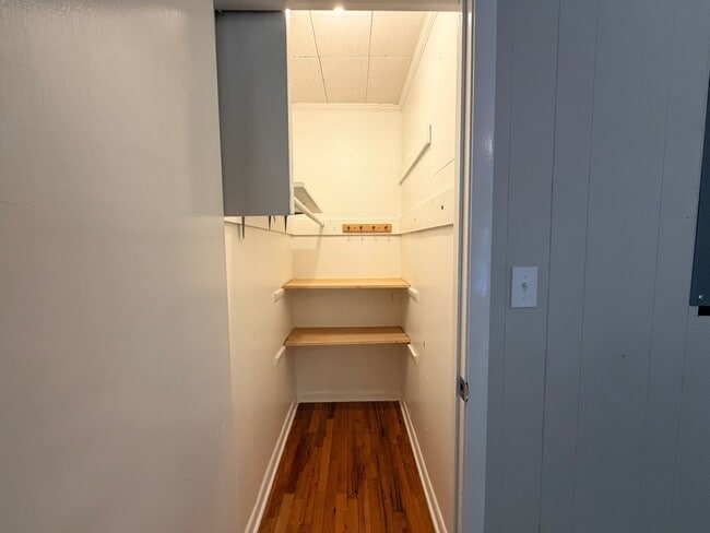 Building Photo - Historic Downtown Charm | Original Floors | Walk to Golf, Dining, Parks, & Concerts