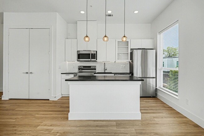 Building Photo - Be the first to live in Unit 207 at 2217 Fitzhugh—a brand-new 2026 construction offering 601 sq f...
