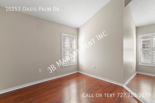 Building Photo - 10253 Oasis Palm Dr
