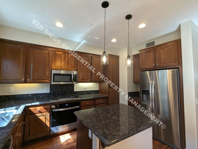 Building Photo - Beautiful San Moritz Townhome - Available ...