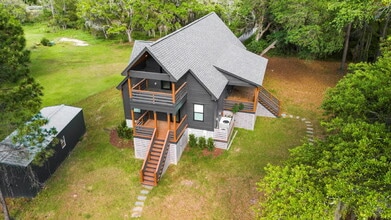 Building Photo - "Spacious 4-Bed Oasis with Guest Suite on ...