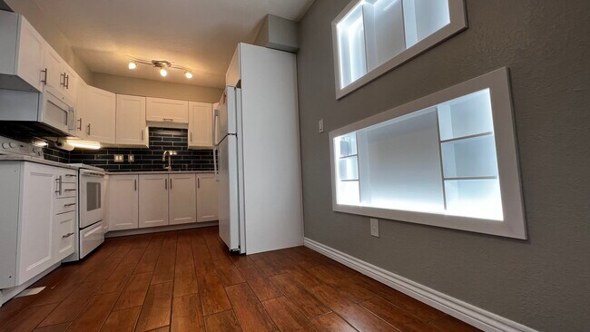 Building Photo - 12057 E Harvard Ave