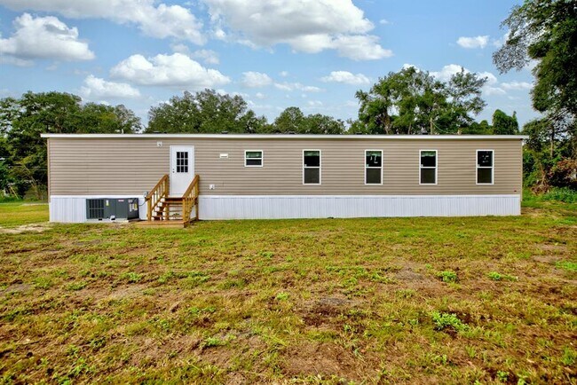 Building Photo - 8595 NW 13th Ct