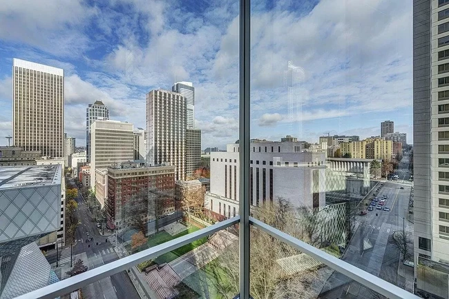 Floor to ceiling glass windows - 909 5th Ave