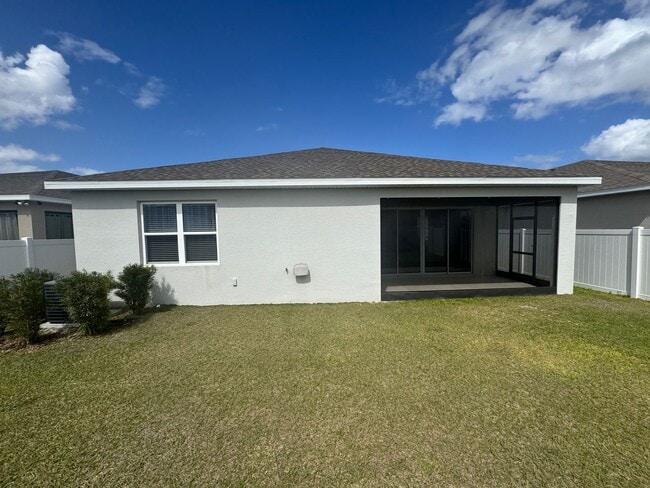 Building Photo - Where Modern Comfort Meets 4BD/3BA Hometown Charm — Your Story Begins in Okahumpka! FULLY-FENCED!...