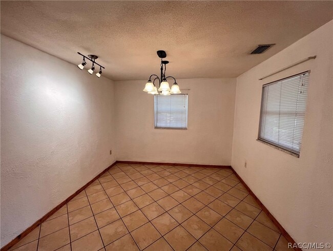 Building Photo - 7660 W Tropical Ln
