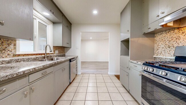 Building Photo - Bright & Clean Single Level FIVE bedroom i...