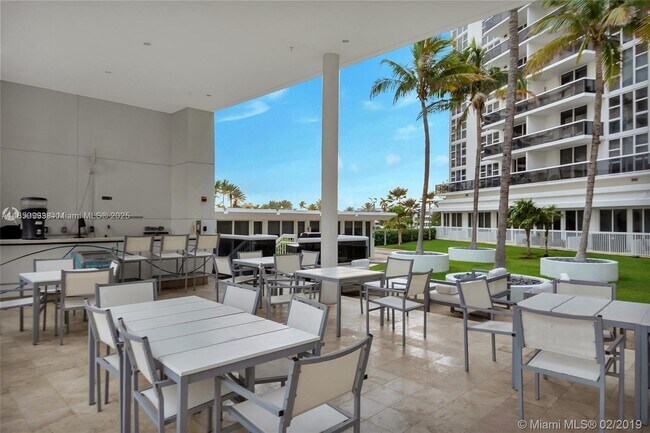 Building Photo - 10275 Collins Ave