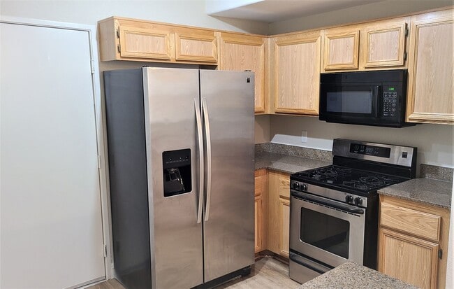 Building Photo - 1 Bedroom in Chateau Nouveau with TWO car tandem attached garage