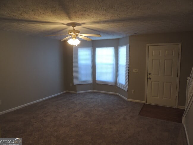 Building Photo - 5659 Windfall Ln